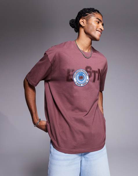 ASOS DESIGN – Brązowy T-shirt oversize z grafiką i naszywką z motywem miasta - view 1