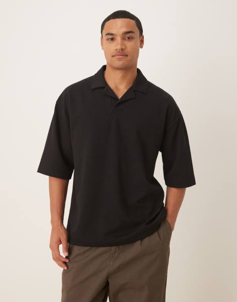 ASOS DESIGN breatheMAX™ heavyweight oversized half sleeve revere polo in black cotton blend - view 1