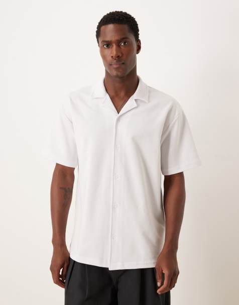 ASOS DESIGN breatheMAX™ heavyweight relaxed polo shirt in white cotton blend - view 1
