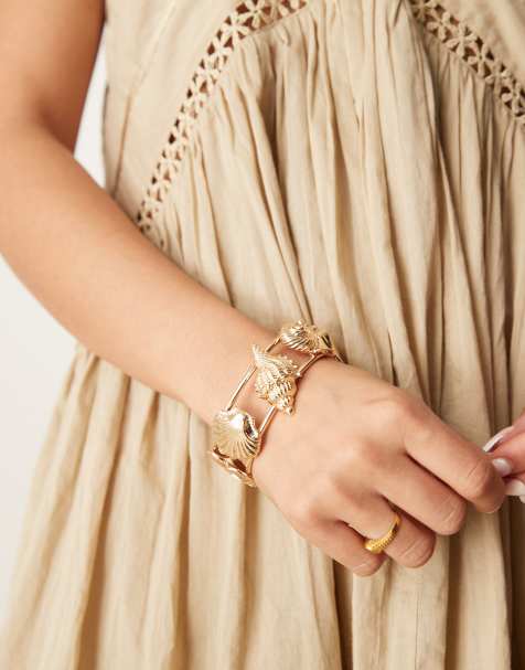 ASOS DESIGN - Brede armband in gemixt schelpenontwerp goudkleur - view 1