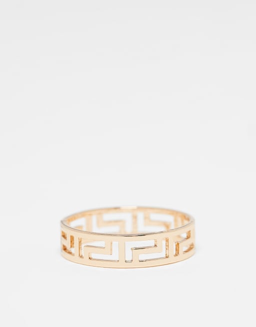 ASOS DESIGN - Brede ring met uitgesneden Griekse golven in goudkleur