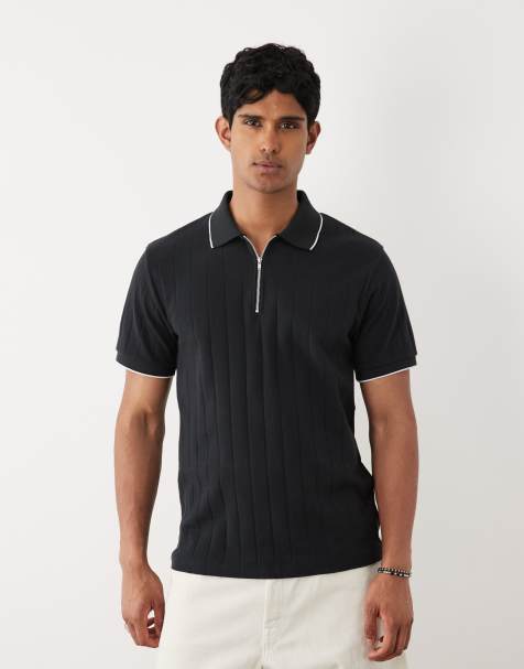 ASOS DESIGN – Breit geripptes Regular-Fit-Polohemd in Schwarz mit Reißverschluss - view 1