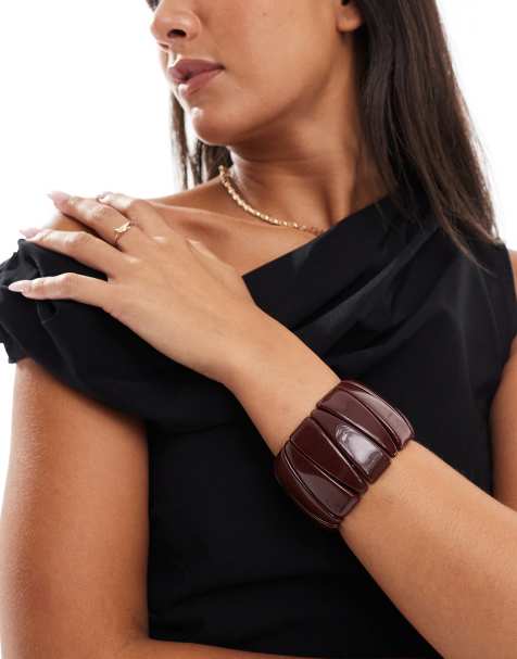 ASOS DESIGN – Breites, elastisches Armband aus Kunstharz in Dunkelbraun - view 1
