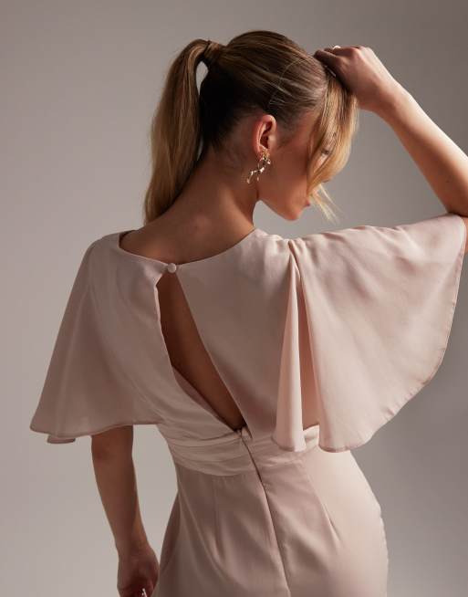 ASOS DESIGN Bridesmaid ruched bodice drape maxi dress with wrap waist and  flutter cape sleeve in blush - ShopStyle