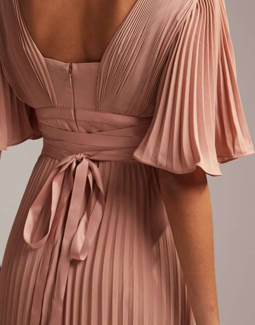 ASOS DESIGN Bridesmaid ruched bodice drape maxi dress with wrap waist and  flutter cape sleeve in blush - ShopStyle