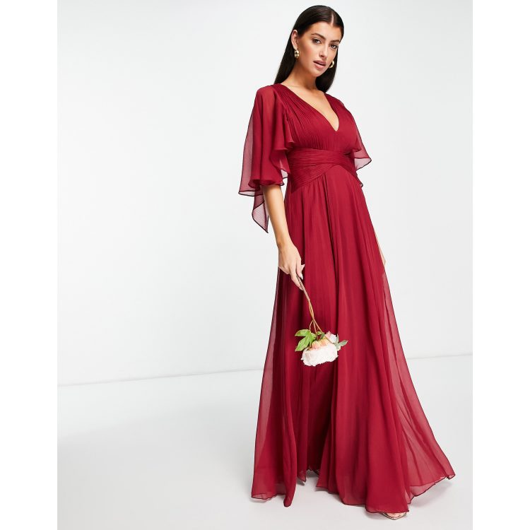 ASOS DESIGN Bridesmaid ruched bodice drape maxi dress with wrap waist and flutter cape sleeve in berry