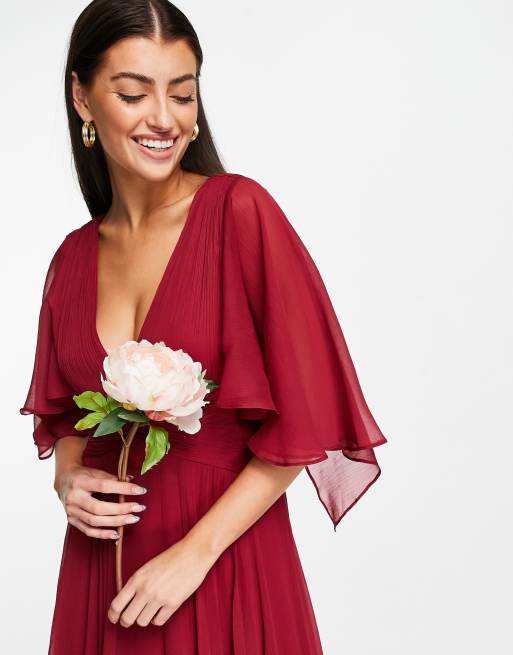 ASOS DESIGN Bridesmaid ruched bodice drape maxi dress with wrap waist and flutter cape sleeve in berry