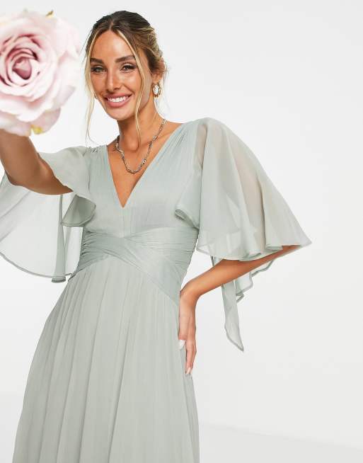 ASOS DESIGN Maternity Bridesmaid ruched bodice drape maxi dress with wrap  waist and flutter cape sleeve in blush