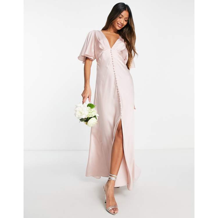 ASOS DESIGN Bridesmaid satin cape sleeve maxi dress with button detail in blush ASOS