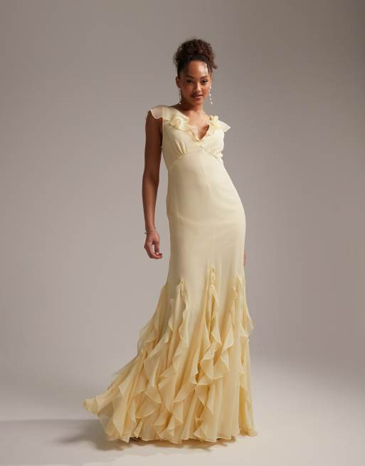 ASOS DESIGN Bridesmaids flutter sleeve bias maxi dress with godet frill hem in pastel yellow ASOS