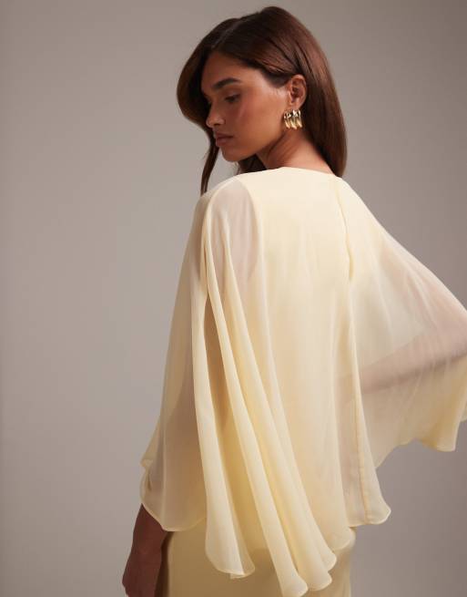 ASOS DESIGN bridesmaids sheer chiffon cape overlay with bias cut satin dress in lemon, 2 of 6
