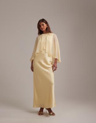 ASOS DESIGN bridesmaids sheer chiffon cape overlay with bias cut satin dress  in lemon | ASOS