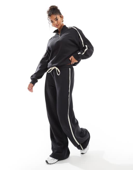 ASOS DESIGN broderie side stripe wide leg trackies in black (part of a set)