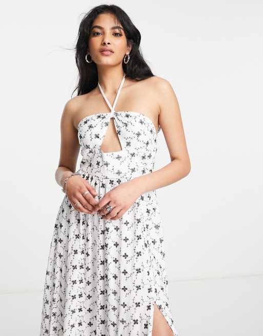 ASOS DESIGN broderie tiered maxi dress with halter cut out in white with  black contrast