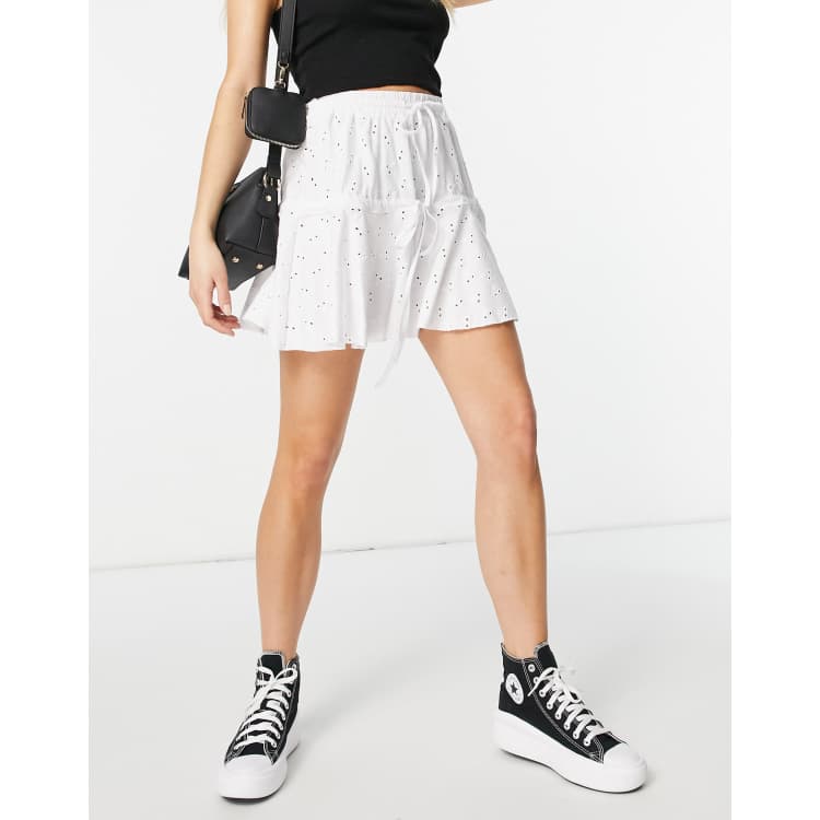 ASOS DESIGN broderie tiered mini skirt with tie detail in white