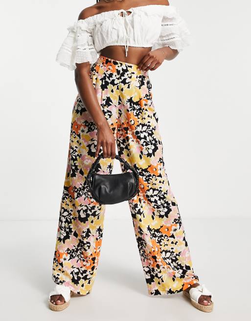 ASOS DESIGN - Broek met geplooid detail en bloemenprint in oranje