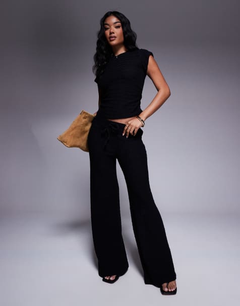ASOS DESIGN - Broek met wijde pijpen, elastische taille en textuur in zwart - view 1