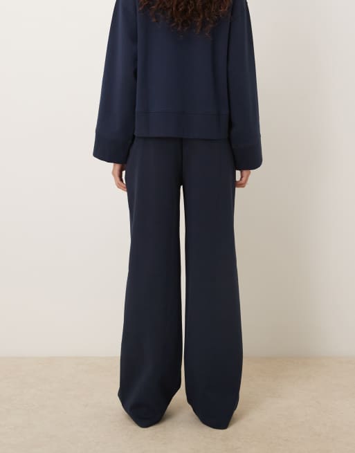ASOS DESIGN - Broek met wijde pijpen en interlock-naden in marineblauw, 3 van 5