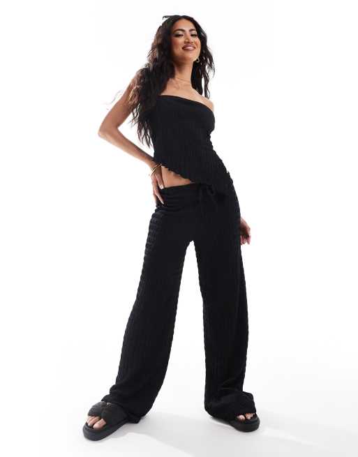 ASOS DESIGN - Broek met wijde pijpen en textuur in zwart, deel van co-ord set