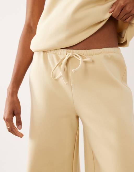 ASOS DESIGN - Broek met wijde pijpen van co-ord set met interlocknaden in lichtgeel, 3 van 5