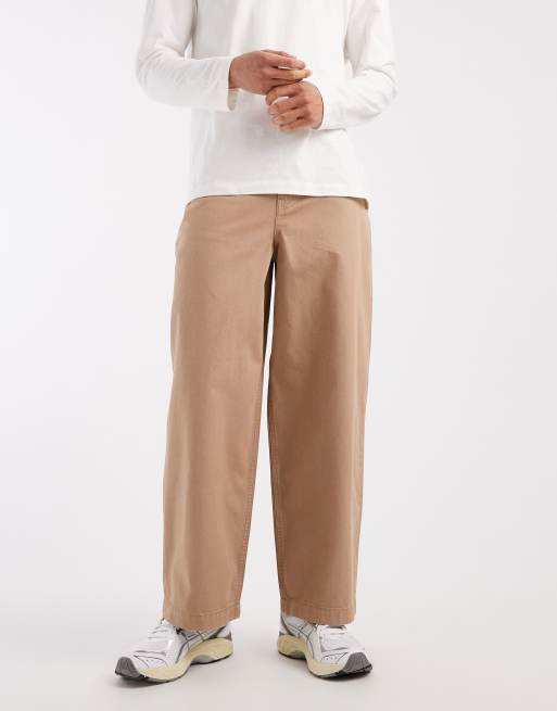 ASOS DESIGN - Broek met wijde ronde pijpen in beige met vintage wassing