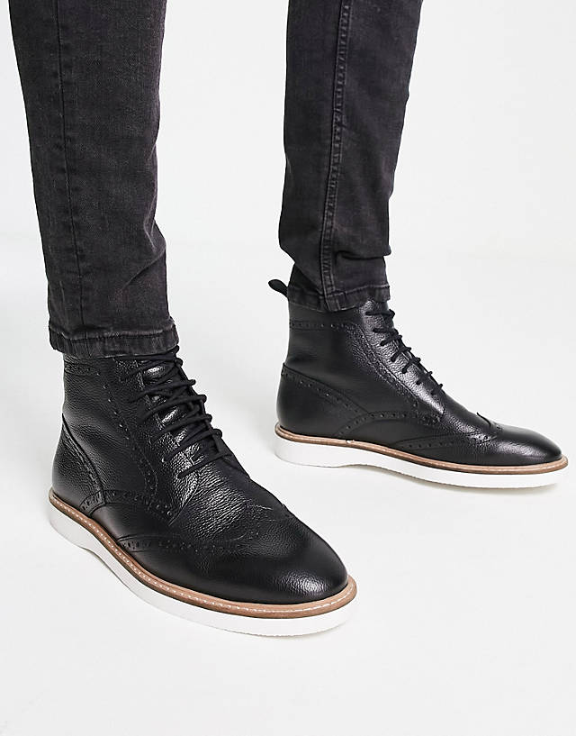 ASOS DESIGN - brogue lace up boots in black leather with white wedge sole