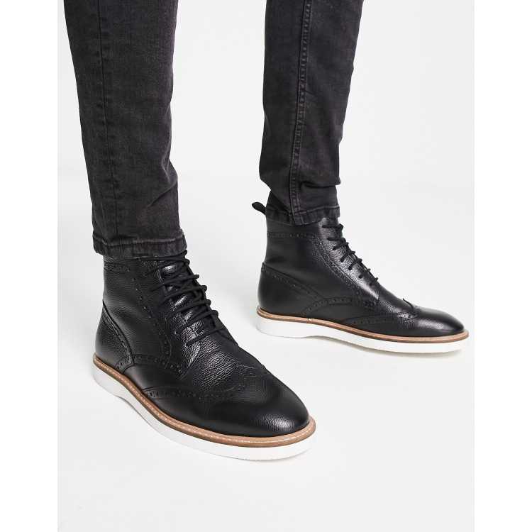 Mens black boots shop with white soles