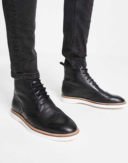 ASOS DESIGN brogue lace up boots in black leather with white wedge