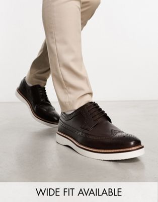 ASOS DESIGN brogue shoe in brown leather on white wedge sole