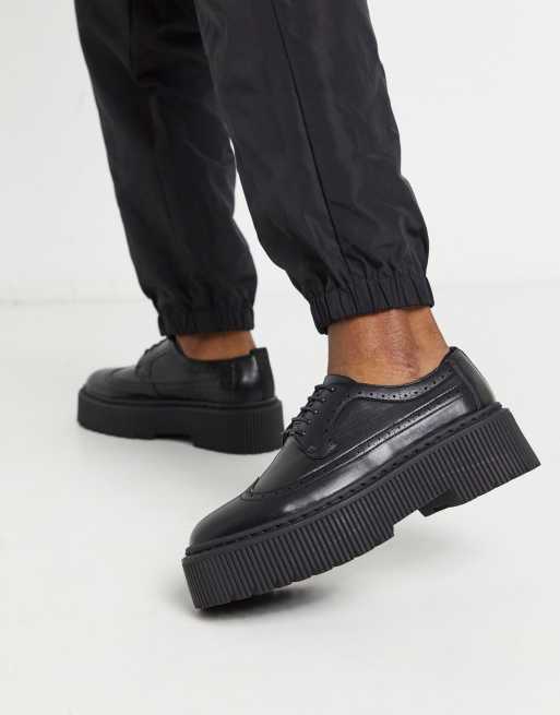 Asos design trainer shoes in black leather with chunky on sale sole