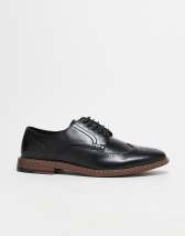 ASOS DESIGN brogue monk shoes in black leather with white wedge