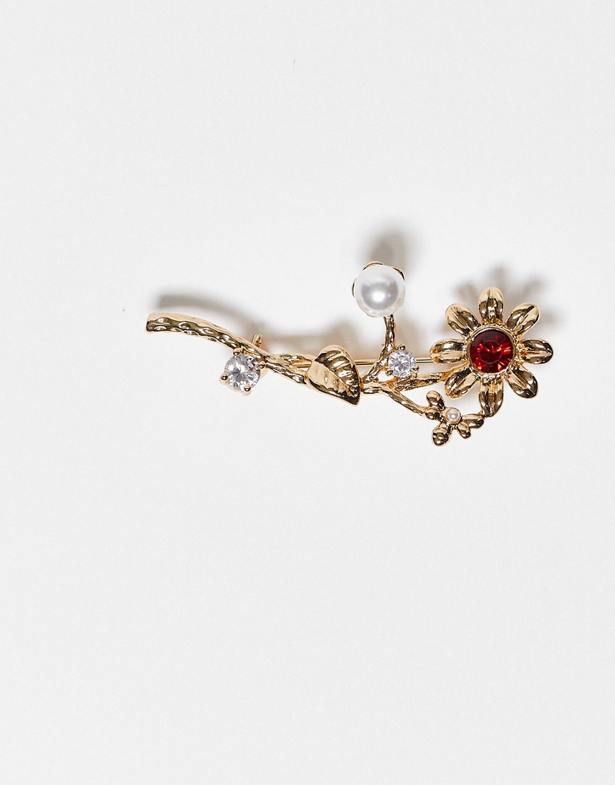 ASOS DESIGN BROOCH WITH FLOWER DESIGN AND CRYSTAL DETAIL IN GOLD TONE
