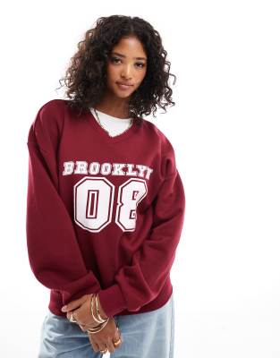 Asos Design Brooklyn Applique Graphic Oversized Sweatshirt In Burgundy-red