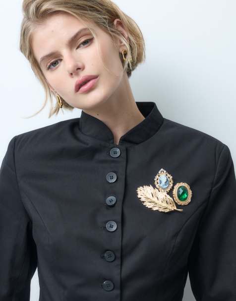 ASOS DESIGN broschset med flera vintageinspirerade stenar och XL guldfärgad fjäderbrosch - view 1