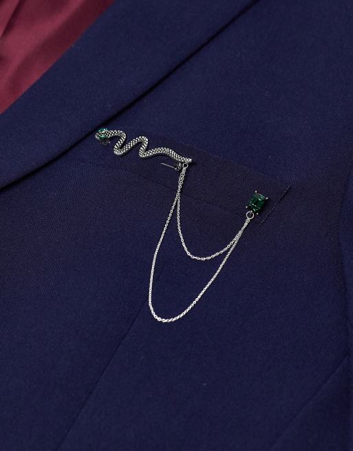 ASOS DESIGN – Broszka w kolorze oksydowanego srebra z motywem węża i zielonymi kryształkami