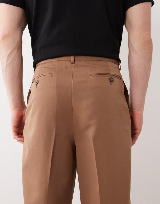 ASOS DESIGN – Bruna, avslappnade, figursydda byxor med avsmalnande passform och veck, 3 av 5