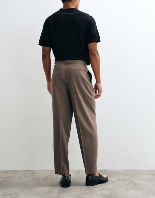 ASOS DESIGN – Bruna, avsmalnande, somriga yllebyxor i oversize med veck, 3 av 5