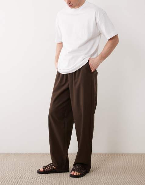 ASOS DESIGN – Bruna, fiskbensmönstrade, lediga, raka byxor med resår och veck - view 1