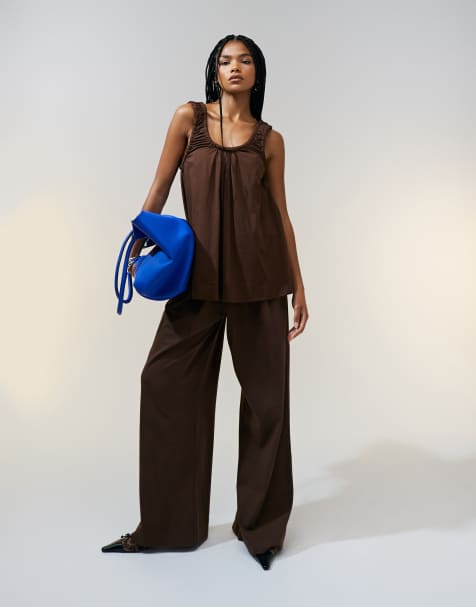 ASOS DESIGN – Bruna, kraftiga byxor med vida ben och veck framtill, del av set - view 1