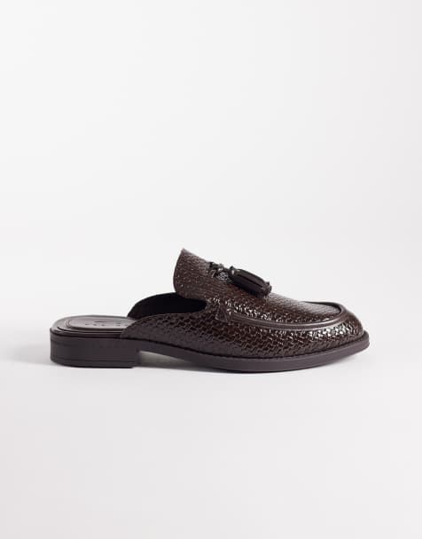 ASOS DESIGN – Bruna, präglade loafers med öppen häl och tofsar - view 1