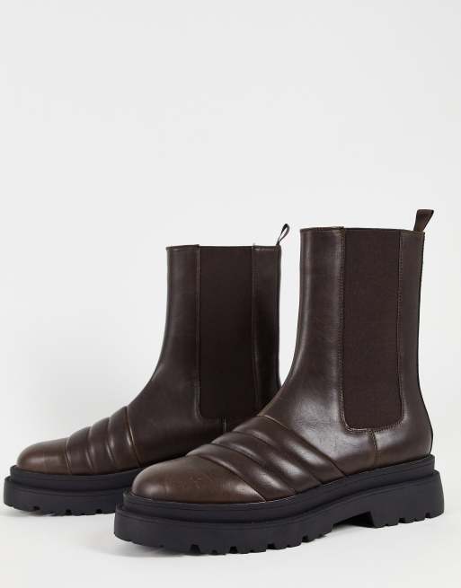 ASOS DESIGN – Bruna, vadderade chelseaboots i läderimitation med staplad sula