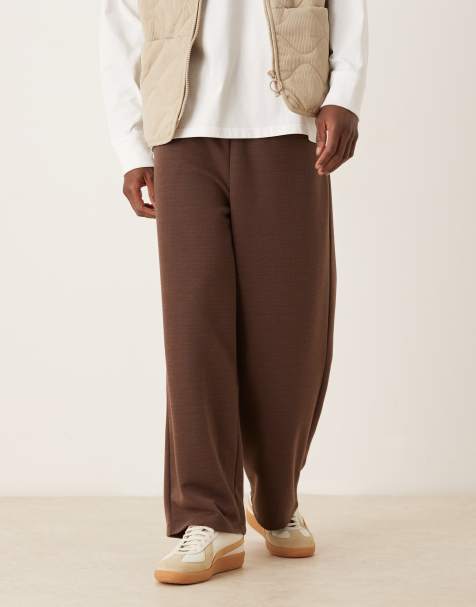 ASOS DESIGN – Bruna, våfflade mjukisbyxor med ballongben och vävt märke - view 1