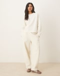 [ASOS DESIGN] ASOS DESIGN brushback barrel leg brushback trackies in cream-White L Cream