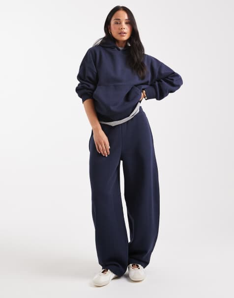 ASOS DESIGN brushback barrel leg sweatpants in navy - view 1