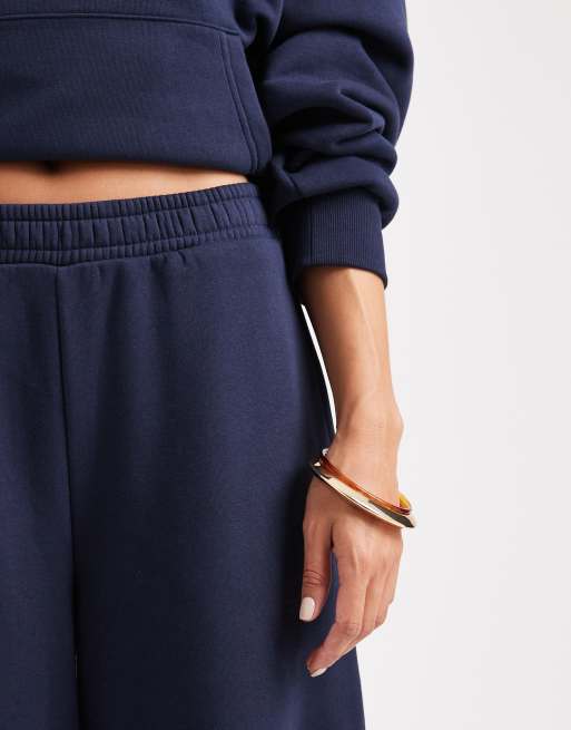 ASOS DESIGN brushback barrel leg brushback jogger in navy