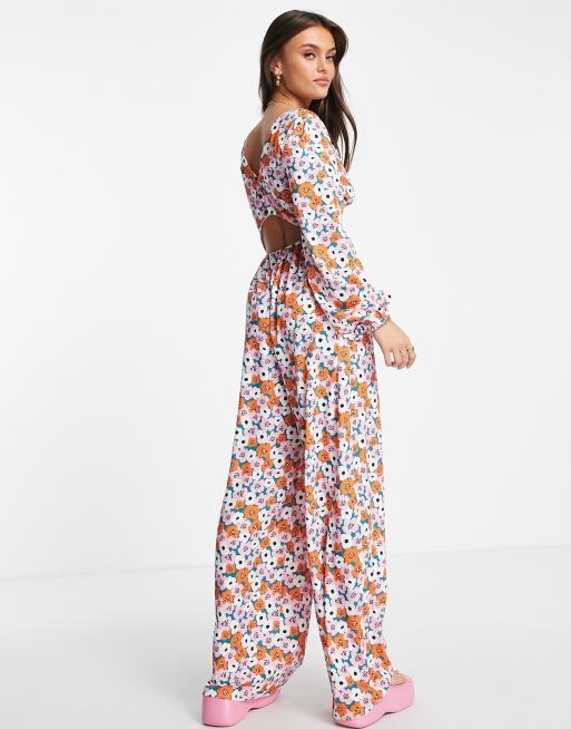 ASOS DESIGN bubble crepe button back long sleeve jumpsuit in floral print