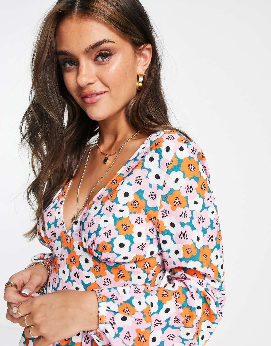 ASOS DESIGN bubble crepe button back long sleeve jumpsuit in