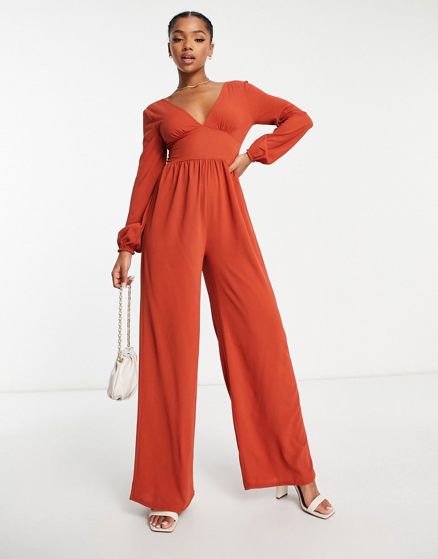 ASOS DESIGN bubble crepe button back long sleeve jumpsuit in rust-Red
