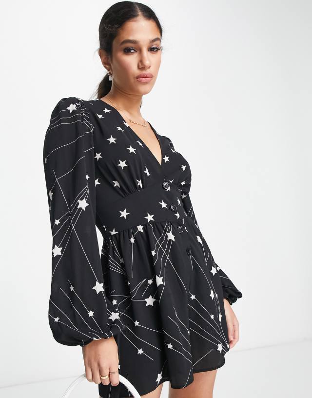 ASOS DESIGN bubble crepe plunge neck romper with puff sleeve in mixed star print