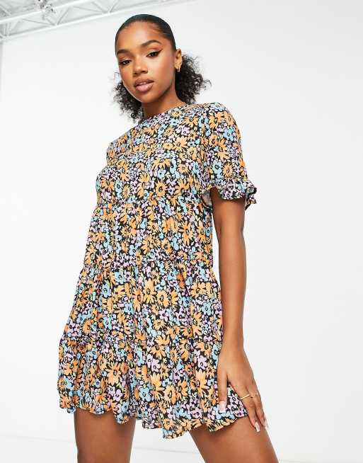 ASOS DESIGN bubble crepe short sleeve tiered smock playsuit in floral ...